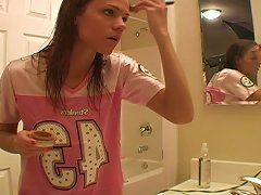 Young Teen Is Doing Make Up In Her Bathroom Using Quite Lots Of Details